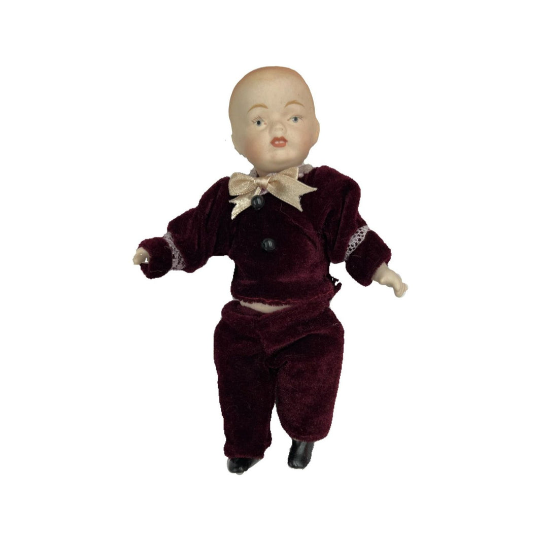 Muñeco porcelana con granate, 15cm